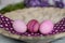 Pink easter eggs on marble bowl