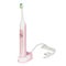 Pink electronic ultrasonic toothbrush on a charge stand