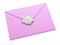 Pink envelope sealed by silver color wax seal