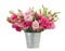 Pink eustoma flowers in metal pot