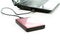 Pink external hard-disk on white