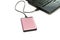 Pink external hard-disk on white