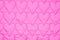 Pink fabric with hearts texture or background