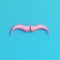 Pink fake mustache on bright blue background in pastel colors