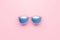 Pink fashion sunglasses and blue lens optic on summer object background with modern accessory design. 3D rendering