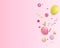 Pink festive background with colorful balloons.