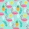 Pink flamingo, pineapples and exotic leaves vector seamless pattern