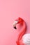 Pink flamingo wearing summer sunglasses. Summer background AI generated