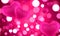 Pink floating hearts on bokeh background