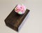 Pink Floral Cupcake on wood and metal