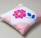 Pink flower on white fabric throw pillow created with generative Ai