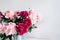 Pink flowers. Curly peony ranunculus in Metallic gray watering can,empty space