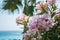 Pink flowers, palm tree and sea views on the coast of Cyprus