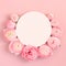 Pink  flowers in round frame with white circle for text.