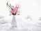 Pink flowers in vase on table Ruellia tuberosa