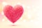 Pink fluffy heart on shining bokeh background