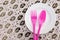 Pink fork and spoon on dish