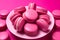 Pink french macaroons on barbie pink background