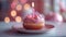 Pink Frosted Donut With Candle