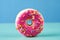 Pink frosted doughnut