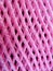 Pink fruit mesh foam sleeve background
