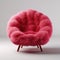 A pink furry chair with wooden legs on a white surface