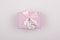 Pink gift with bow on a white background. Heart note I love You.