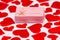 Pink Gift Box Surrounded by Scattered Hearts