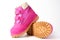 Pink girls nubuck boots isolated on white. Children shoes with velcro fasteners