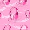 Pink girly headphones with a cable seamless pattern. Music genres, audio connection illustration.