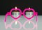 Pink glasses and candles.