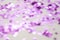 Pink glitter background unfocused. Abstract heart shaped purple sparkling glitter. Christmas, holidays