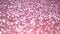 Pink glitter festive texture. Brilliant background for holiday. A beautiful magic bokeh