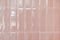 Pink glossy upright rectangular ceramic tile, background, texture