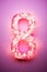 Pink glowing number eight. 8 Years Old. Eighth Birthday Celebration. Girls party. Girl celebrates. Special event