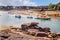 Pink Granite Coast, yachts and boats in harbor, textured unique pink granite boulders. Ploumanach, Perros-Guirec, Brittany France.