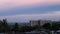 Pink Gray Blue Sunset over Industrial City. Timelapse. Zoom