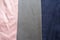 Pink, grey and blue artificial suede strips sewn together vertically