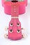 Pink Hawaiian ukulele