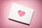 pink heart cut out of paper filled with sisal. Valentine\\\'s day greeting card. I love you.