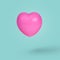 Pink heart floating in air isolated on pastel blue colour background