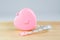 Pink heart Measuring Tape on wood