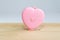 Pink heart Measuring Tape on wood