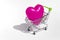 Pink heart in the shopping cart