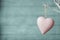 Pink Heart on White Tree with Turquoise Wood Plank Background