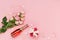 Pink hearts, bottle of wine and gift box on pastel pink background. Valentines day concept. Flat lay, top view, copy space