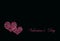 Pink hearts made of decorative tiny hearts placed on black surface with Valantine`s Day lettering