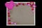 Pink hearts and pom poms border on a simple message board, space