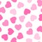 Pink hearts seamless pattern. Random scattered hearts background. Love or Valentine theme. Vector illustration