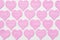 Pink hearts with text LOVE, KISS, FOREVER YOURS on white background. Valentines day texture or wallpaper. Gift for lover